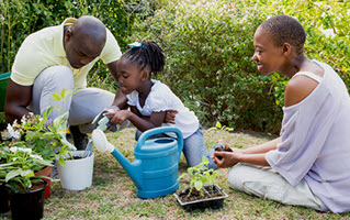 family in garden on summer day